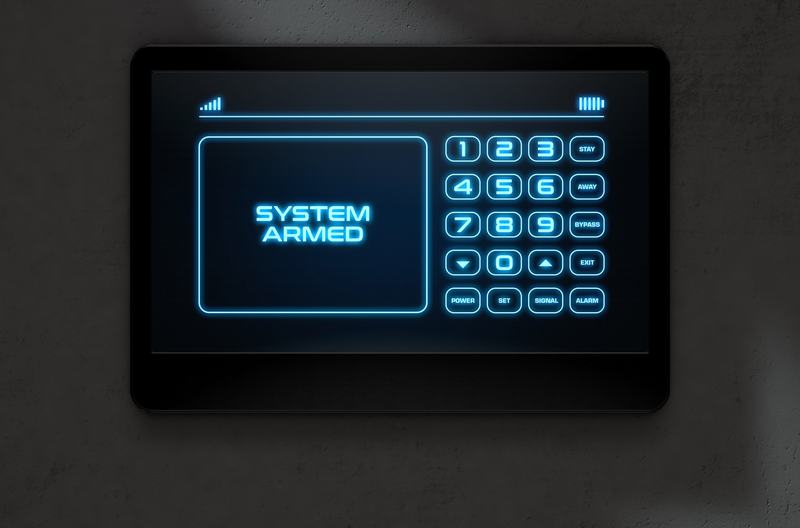 Alarm keypad showing System Armed